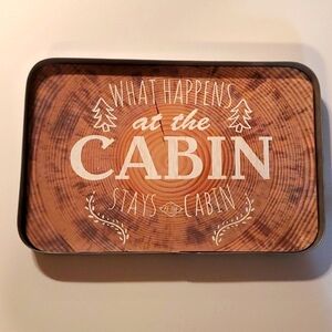 What happens at the cabin stays at the cabin sign